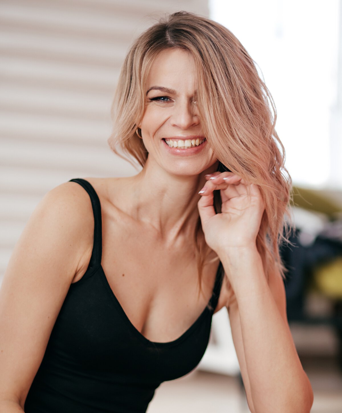 Atlanta facial implants Model with blonde hair