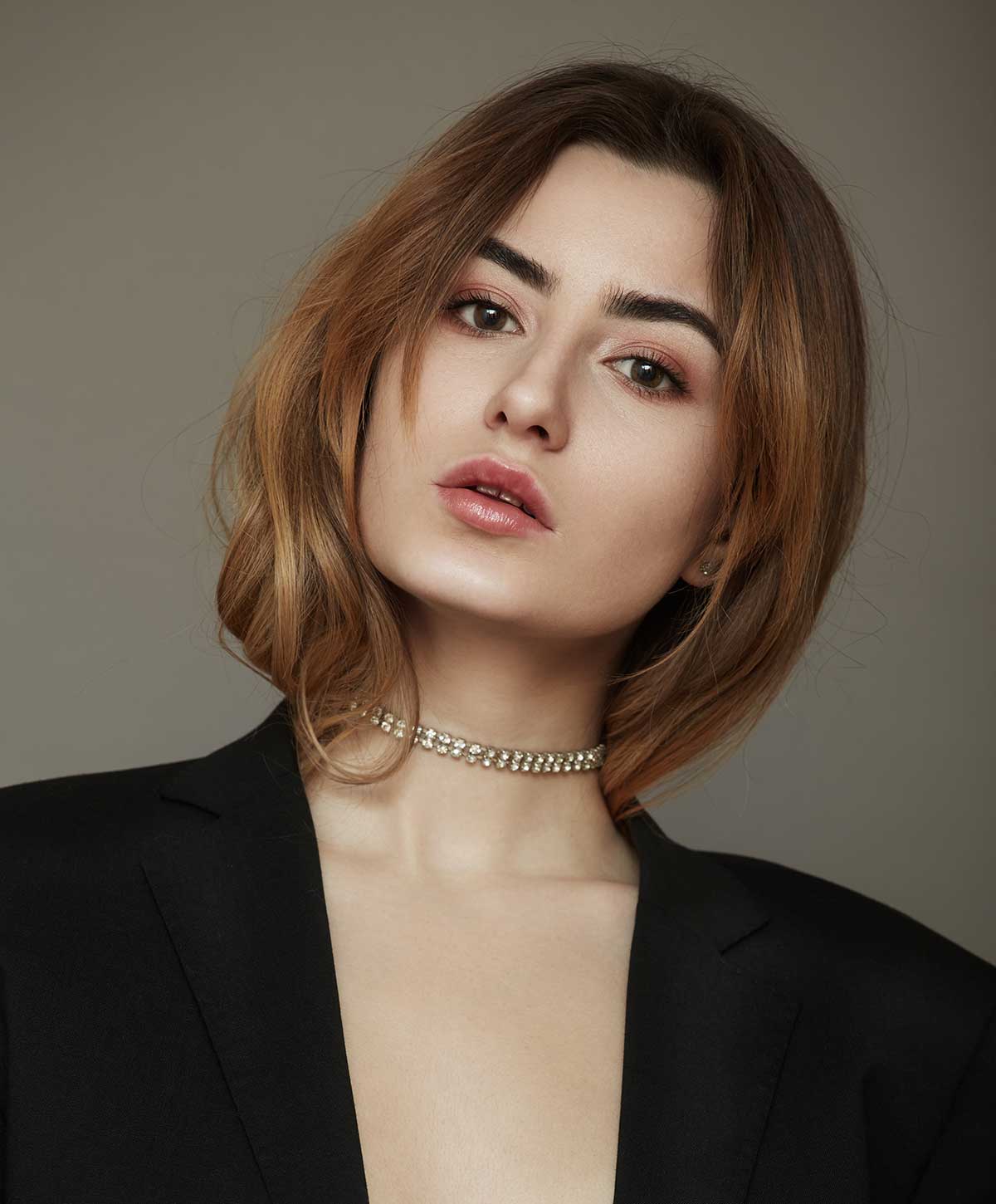 Atlanta gender affirmation surgery model with red hair